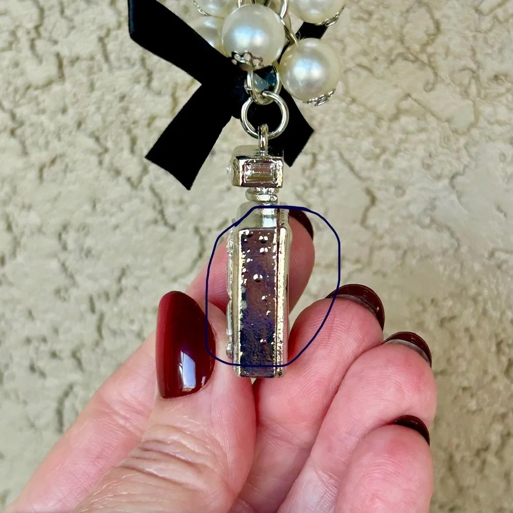 Luxe Silver Perfume Bottle Keychain/Bag Charm with Black Bow